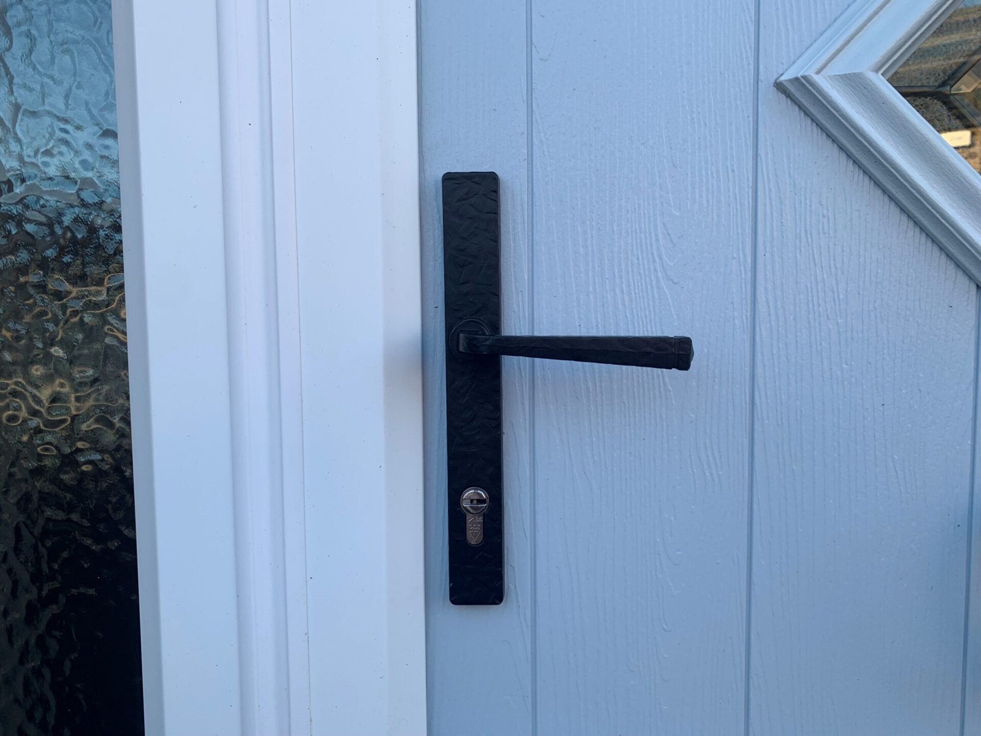 noble handle on duck egg blue door